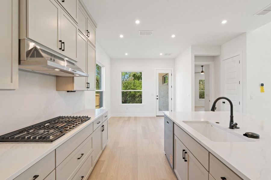 Furnished interior view inside a new home in Persimmon, Buda (Image 5).