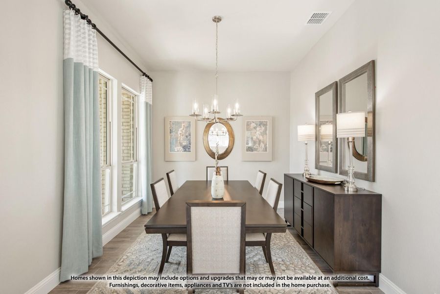 Formal dining room with dark wood table, chandelier, sideboard, and large windows with light blue curtains Formal dining room with dark wood table, chandelier, sideboard, and large windows with light blue curtains