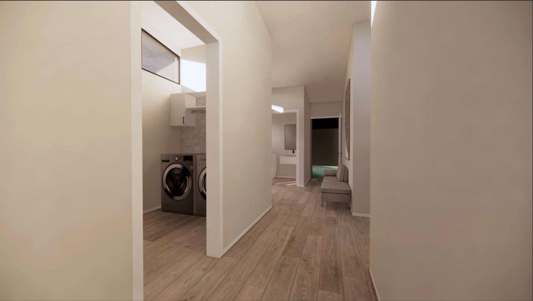 RENDERING - Corridor featuring light wood-style flooring and washing machine and clothes dryer