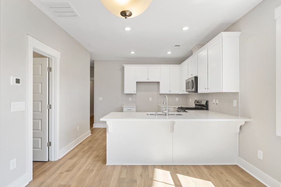 Representative furnished interior of a home built from the Holland by Hunter Quinn Homes in Victor Park, Greer (Image 5).