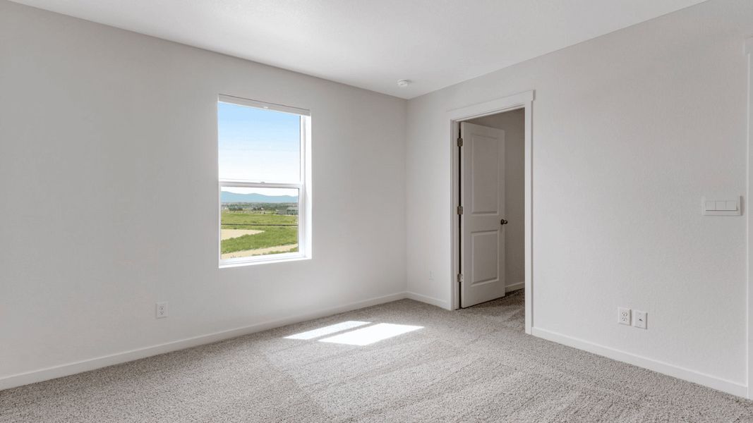 Spacious, unfurnished interior of a new home in Vista Meadows, Fort Lupton (Image 11).