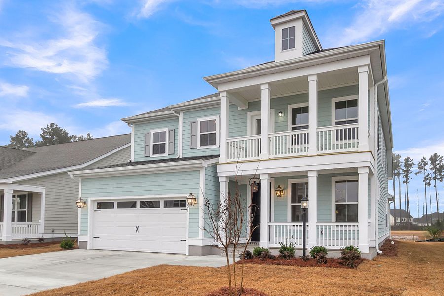 Front exterior of a new home in Cherrywood Estates, Summerville, SC, highlighting curb appeal (Image 21). Front exterior of a new home in Cherrywood Estates, Summerville, SC, highlighting curb appeal (Image 21).