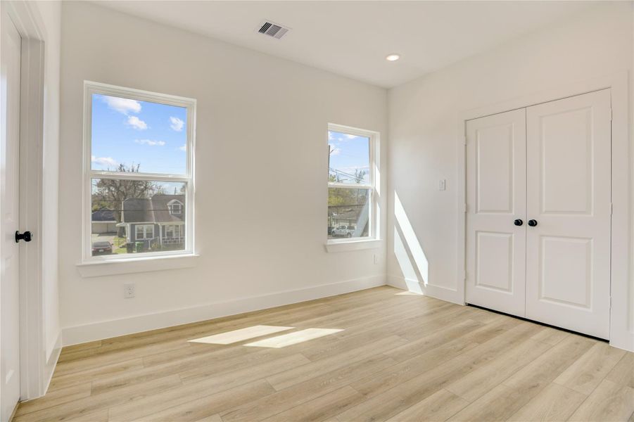 The 9x11 SF 3rd bedroom has a large wall closet and en suite bath.