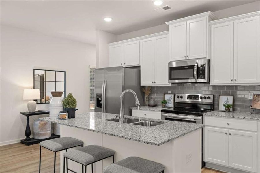 Furnished interior view inside a new home in Rivershire Place, Villa Rica (Image 12).