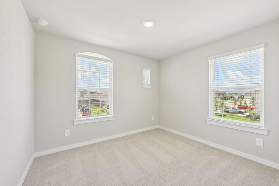 Spacious, unfurnished interior of a new home in Sundance Cove - Premier Series, Crosby (Image 19).