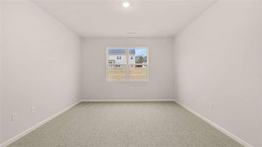 Spacious, unfurnished interior of a new home in Brooks Station, Dacula (Image 26).