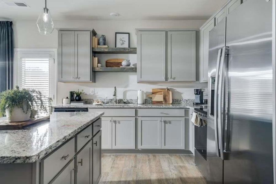 Furnished interior view inside a new home in The Grove At Mundy Mill, Gainesville (Image 7). Furnished interior view inside a new home in The Grove At Mundy Mill, Gainesville (Image 7).