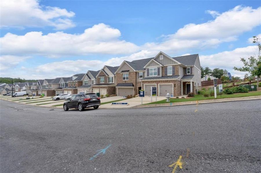 Front exterior of a new home in Park Center Pointe, Austell, GA, highlighting curb appeal (Image 26).