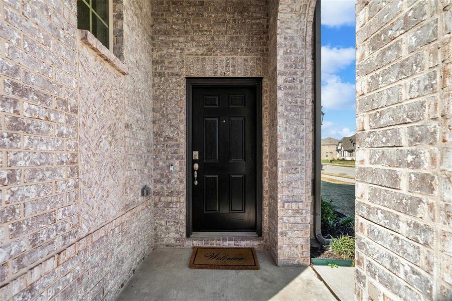 Front exterior of a new home in , Justin, TX, highlighting curb appeal (Image 23). Front exterior of a new home in , Justin, TX, highlighting curb appeal (Image 23).