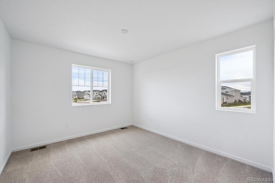 Spacious, unfurnished interior of a new home in Fossil Creek, Windsor (Image 12).