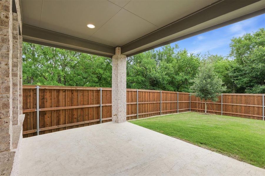 Exterior details and patio area of a home in Prairie Oaks, Oak Point (Image 23). Exterior details and patio area of a home in Prairie Oaks, Oak Point (Image 23).