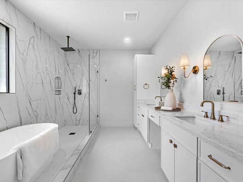 Primary bathroom details; dual sinks, extra storage space, plenty of counter space, an amazing crystal like countertop