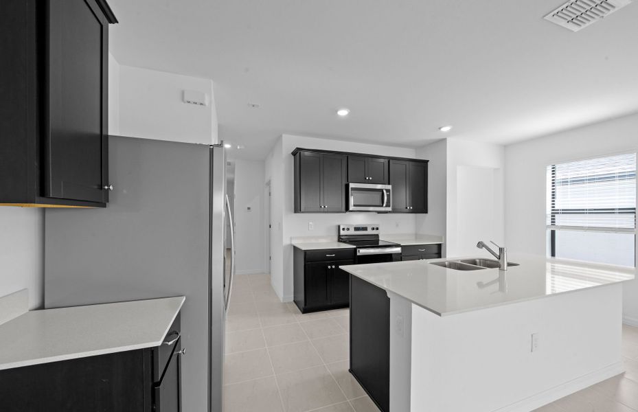 Furnished interior view inside a new home in Whispering Lakes, Lehigh Acres (Image 7). Furnished interior view inside a new home in Whispering Lakes, Lehigh Acres (Image 7).