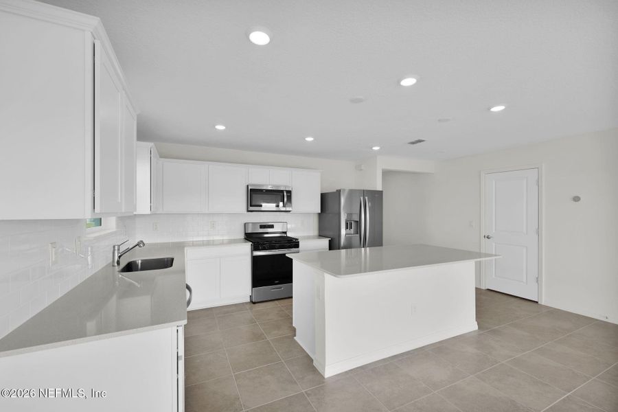 Furnished interior view inside a new home in Wells Landing, Jacksonville (Image 6).