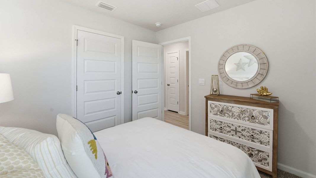 Furnished interior view inside a new home in Chateau Nemours, Port Saint Joe (Image 28).