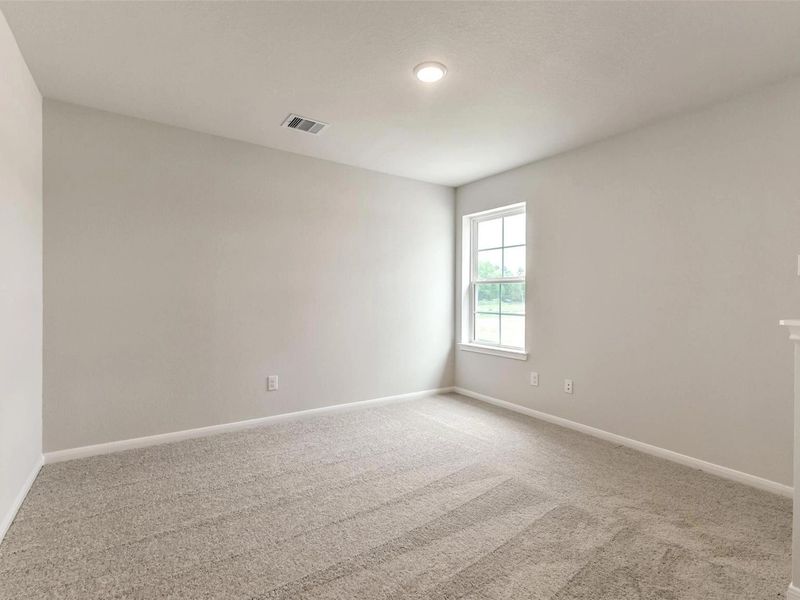 Spacious, unfurnished interior of a new home in Caney Creek Place, Conroe (Image 27).