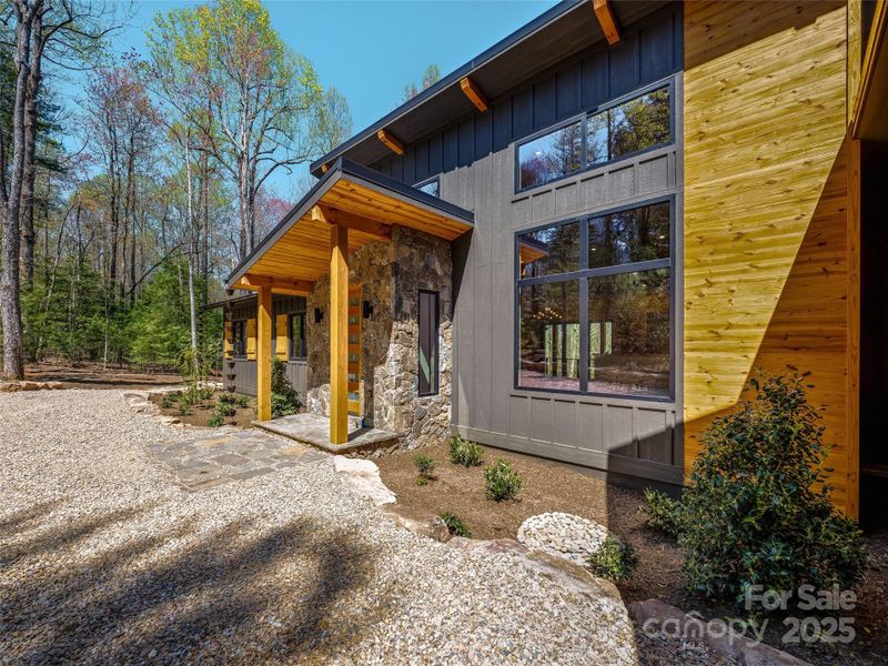 Front exterior of a new home in , Brevard, NC, highlighting curb appeal (Image 25).