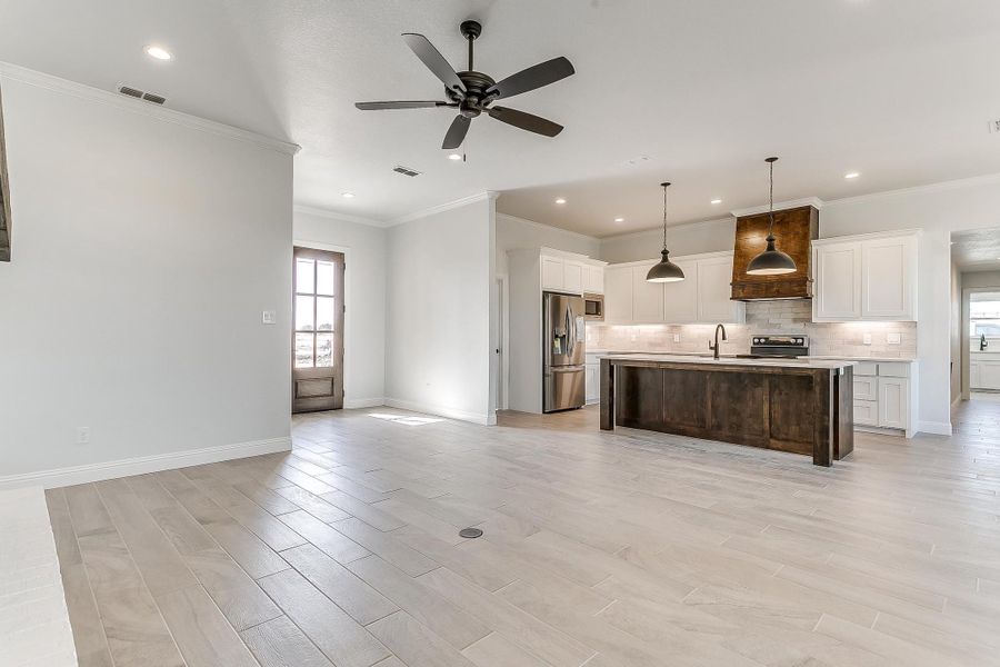 Representative furnished interior of a home built from the Refuge Lane by Trinity Classic Homes in Zion Trails, Poolville (Image 19).