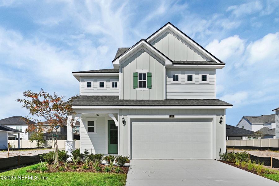 Front exterior of a new home in Seabrook Village at Nocatee, Ponte Vedra, FL, highlighting curb appeal (Image 23).