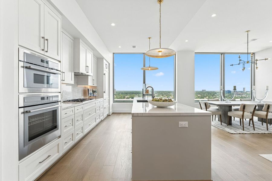 Gourmet kitchen fully equipped with top-of-the-line Thermador appliances, Paneled Sub-Zero refrigerator with two freezer drawers, built-in microwave, under-cabinets lightinfg and custom-built soft closing drawers and cabinetry Gourmet kitchen fully equipped with top-of-the-line Thermador appliances, Paneled Sub-Zero refrigerator with two freezer drawers, built-in microwave, under-cabinets lightinfg and custom-built soft closing drawers and cabinetry