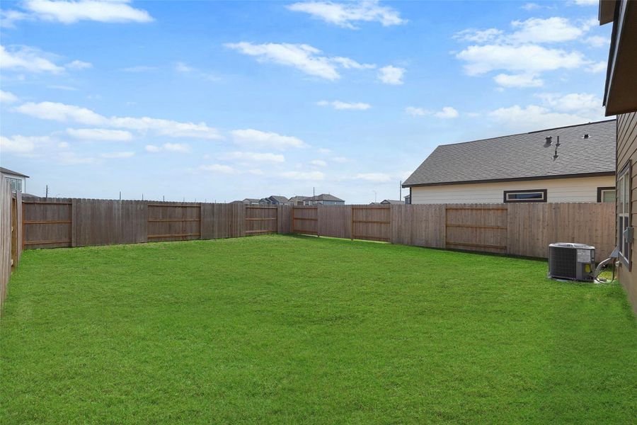Exterior details and patio area of a home in Glendale Lakes, Arcola (Image 3).