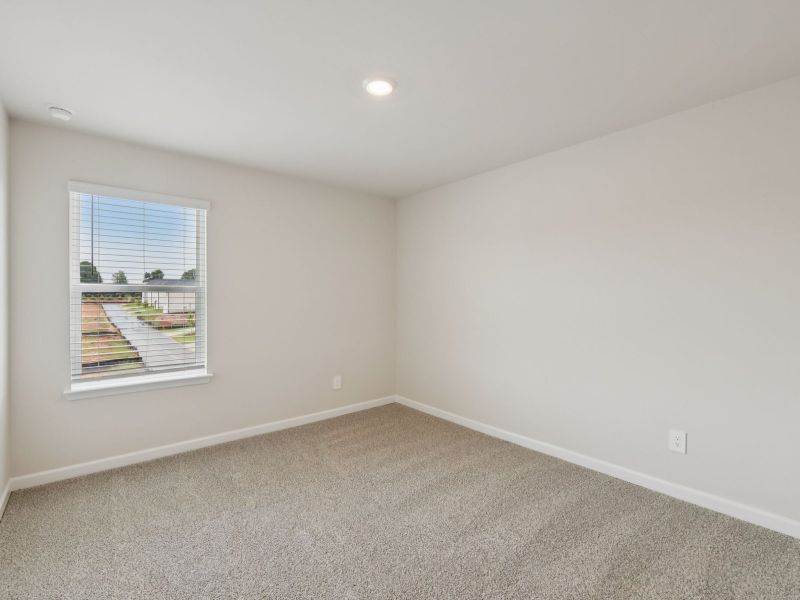 Spacious, unfurnished interior of a new home in Marshburn Landing - Bungalow Series, Wendell (Image 20).