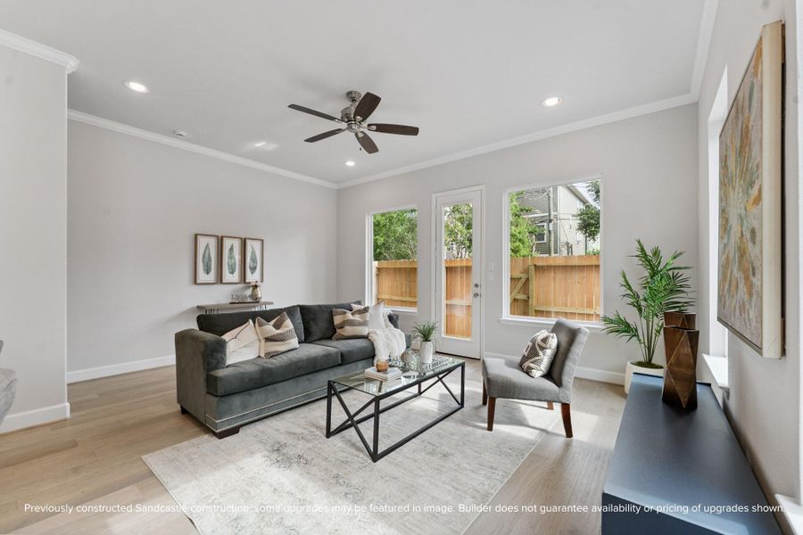 Durable and Stylish Flooring – Hardwood floors throughout the main living areas add warmth and sophistication to the home’s design.