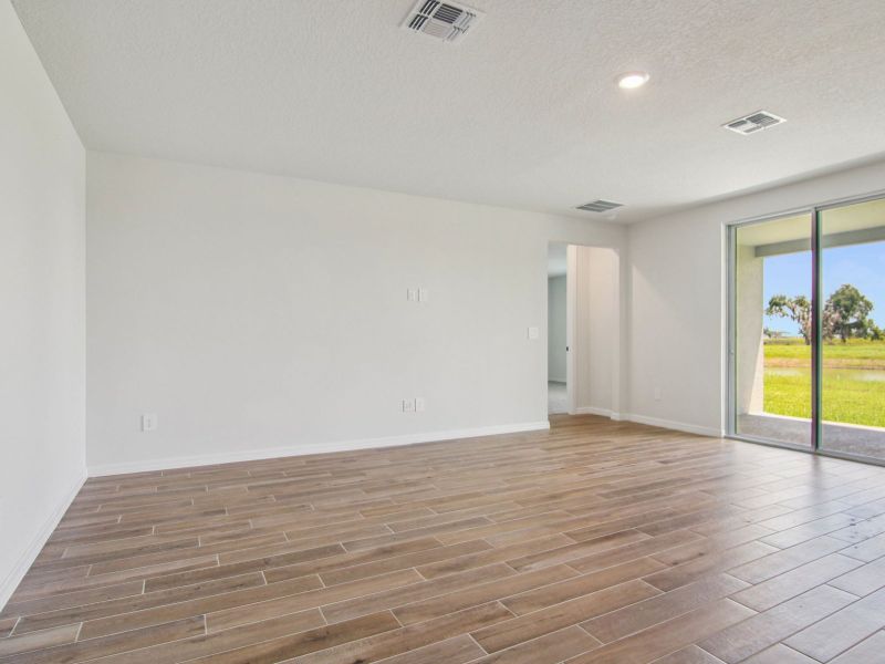 Spacious, unfurnished interior of a new home in Oakfield Trails - Signature Series, Parrish (Image 10). Spacious, unfurnished interior of a new home in Oakfield Trails - Signature Series, Parrish (Image 10).
