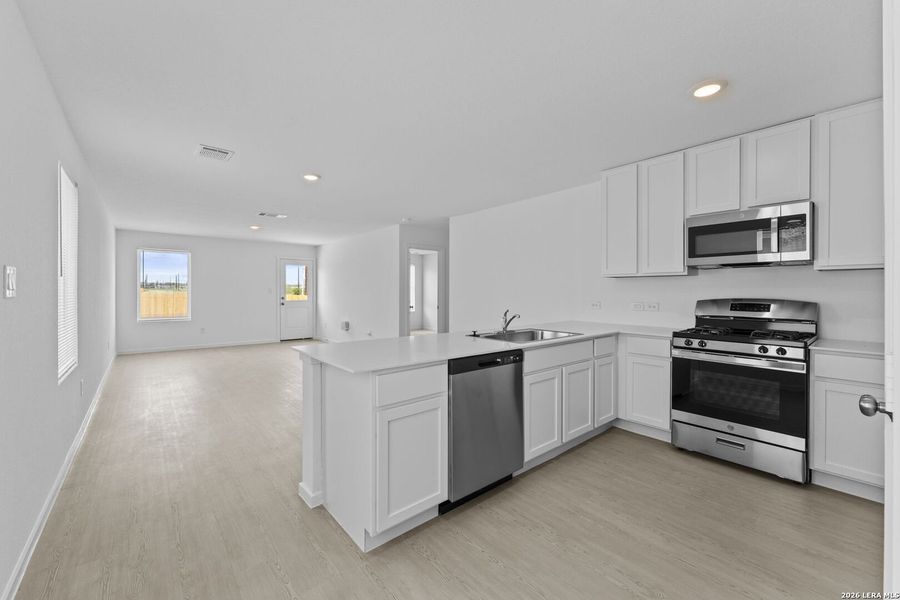 Furnished interior view inside a new home in Spring Grove, San Antonio (Image 7).