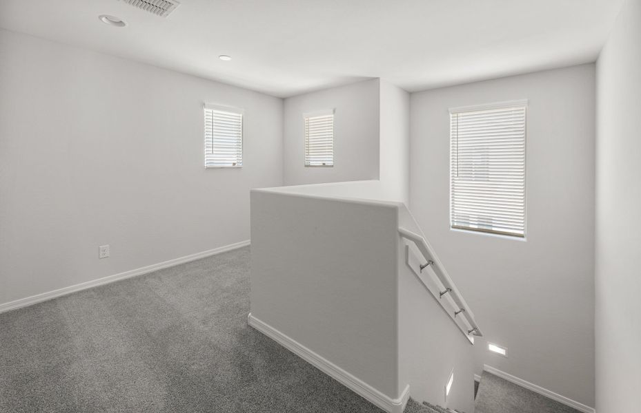 Spacious, unfurnished interior of a new home in Asante- Atrium Series, Surprise (Image 16).