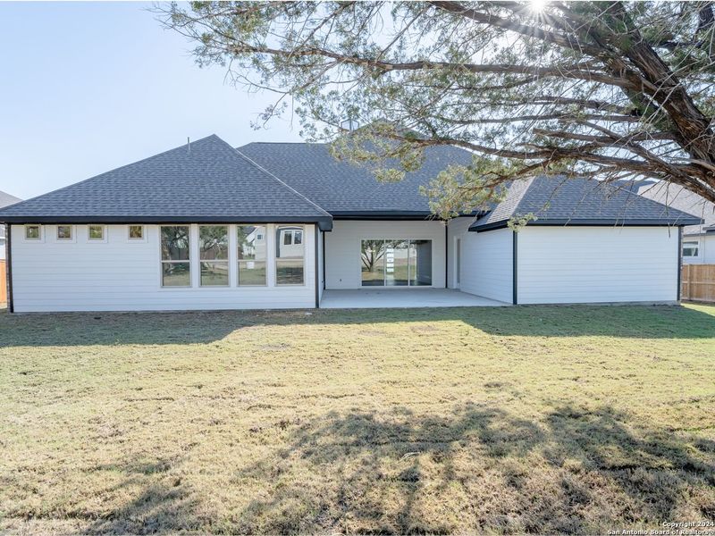Exterior details and patio area of a home in Potranco Oaks, Castroville (Image 14). Exterior details and patio area of a home in Potranco Oaks, Castroville (Image 14).