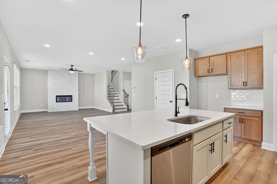 Furnished interior view inside a new home in Stone Brooke, Gray (Image 8).