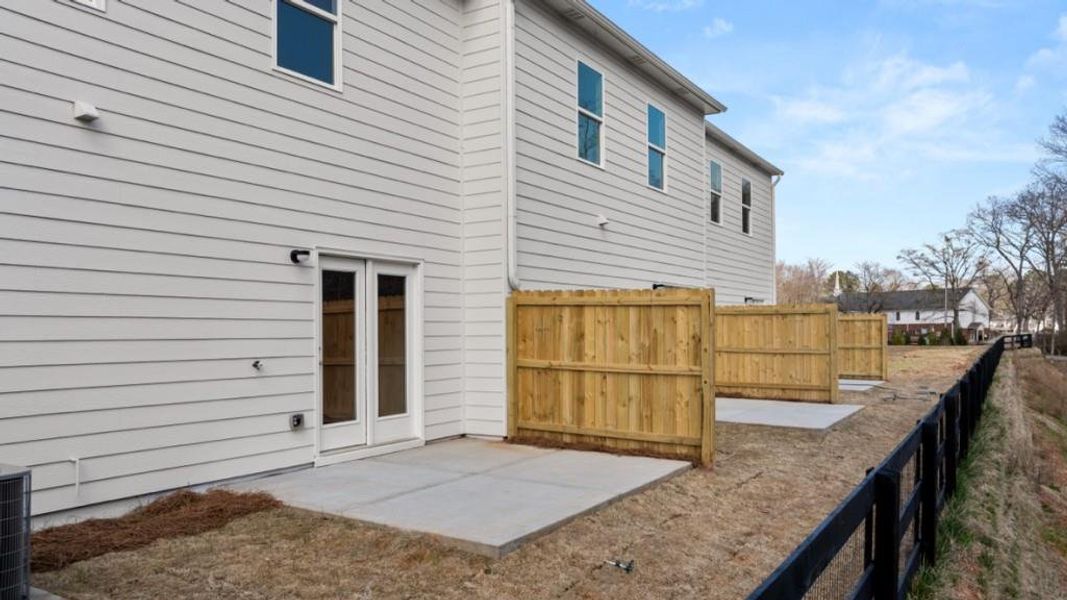 Exterior details and patio area of a home in Falcon Landing, Gainesville (Image 3).