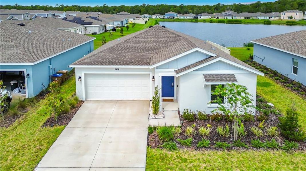 Front exterior of a new home in , Kissimmee, FL, highlighting curb appeal (Image 25).