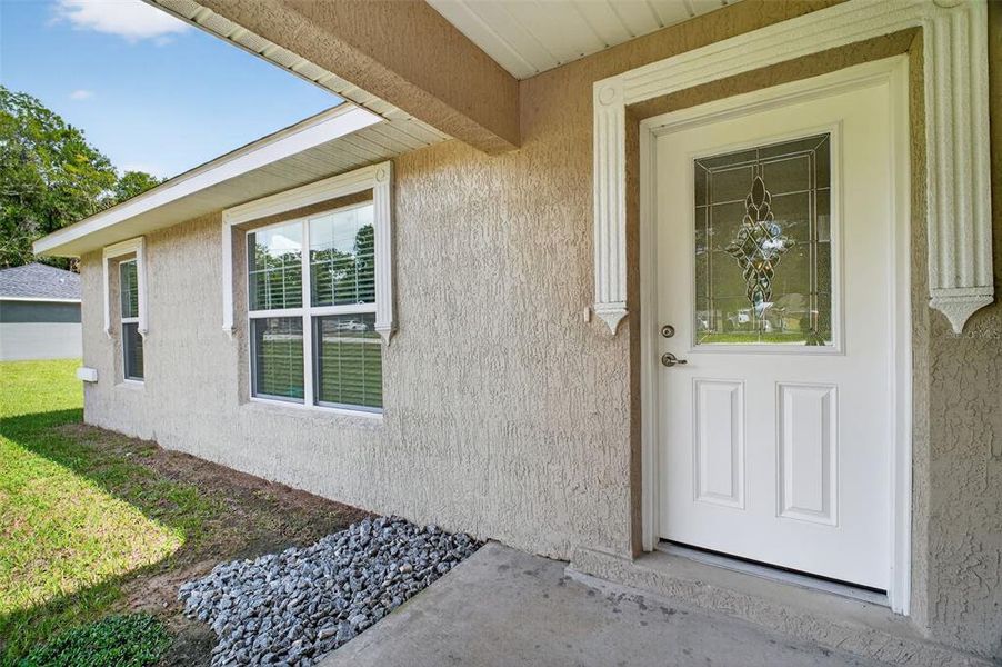 Front exterior of a new home in , Ocala, FL, highlighting curb appeal (Image 15). Front exterior of a new home in , Ocala, FL, highlighting curb appeal (Image 15).