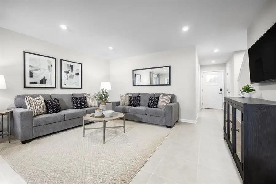 Furnished interior view inside a new home in Seminole Palms Townhomes, Palm Coast (Image 8).