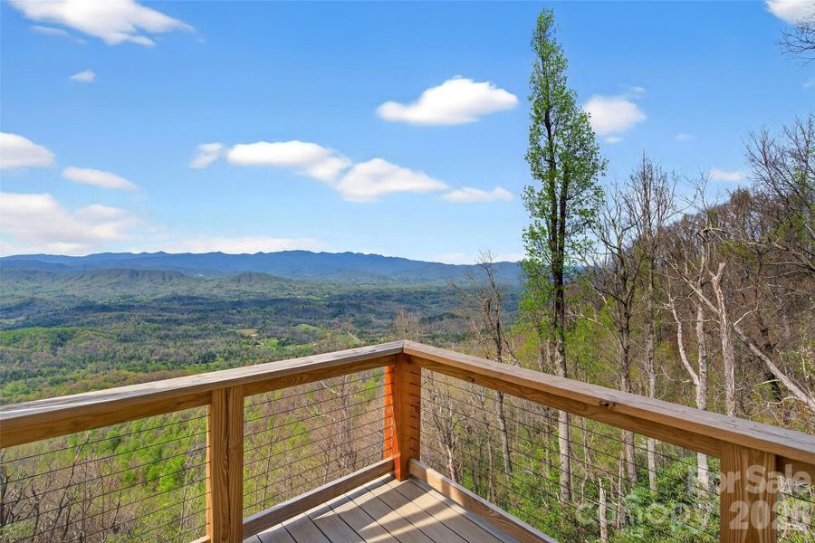 View layers and layers of mountains in all directions.