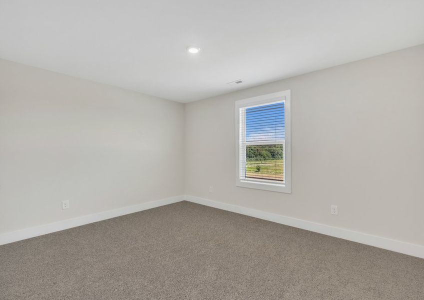 The secondary bedroom has lots of space.