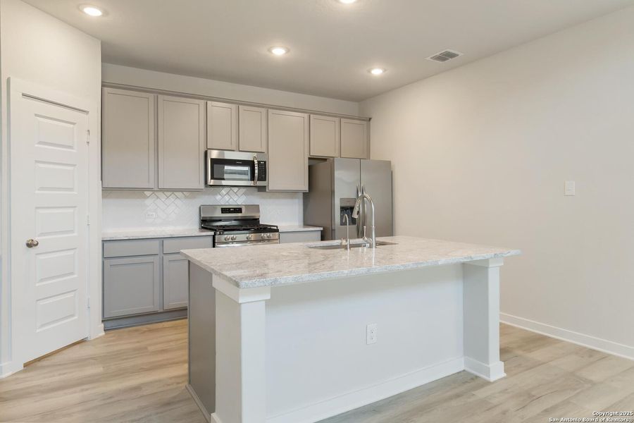 Furnished interior view inside a new home in Timber Creek, San Antonio (Image 6).