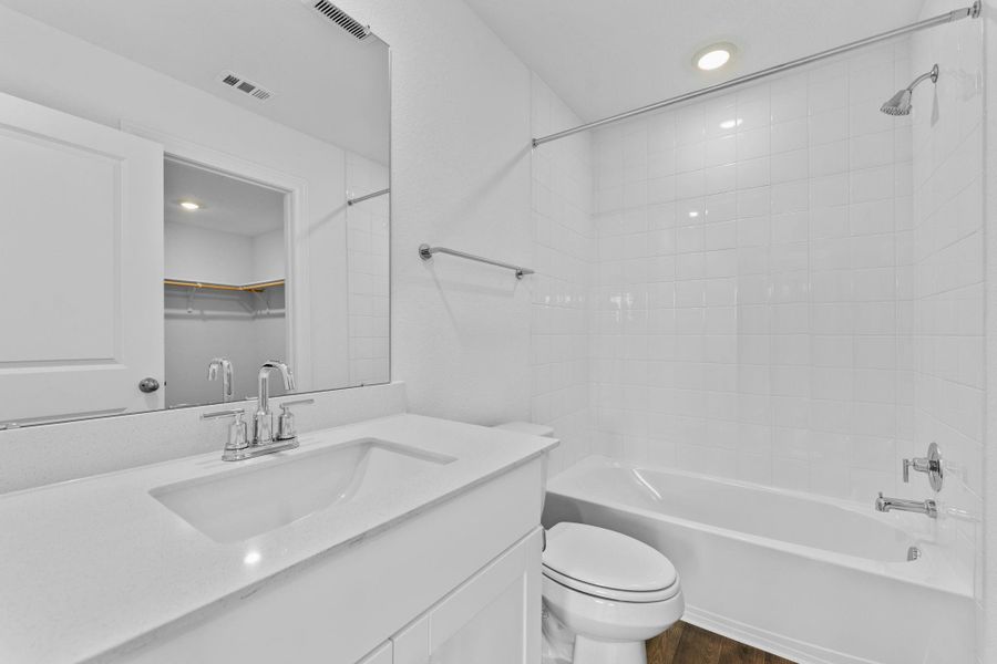 Furnished interior view inside a new home in Railhead, Cedar Creek (Image 11).