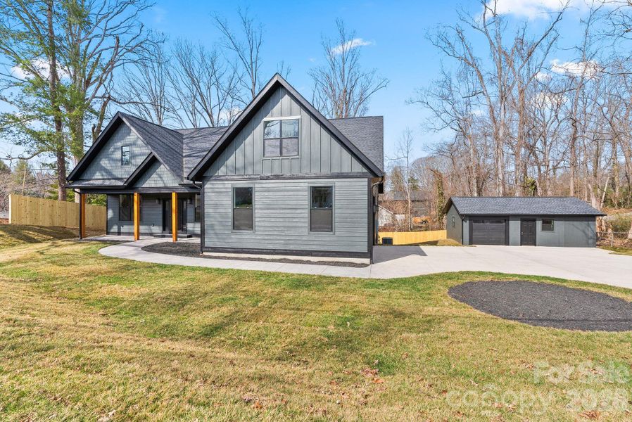Front exterior of a new home in , Asheville, NC, highlighting curb appeal (Image 33).