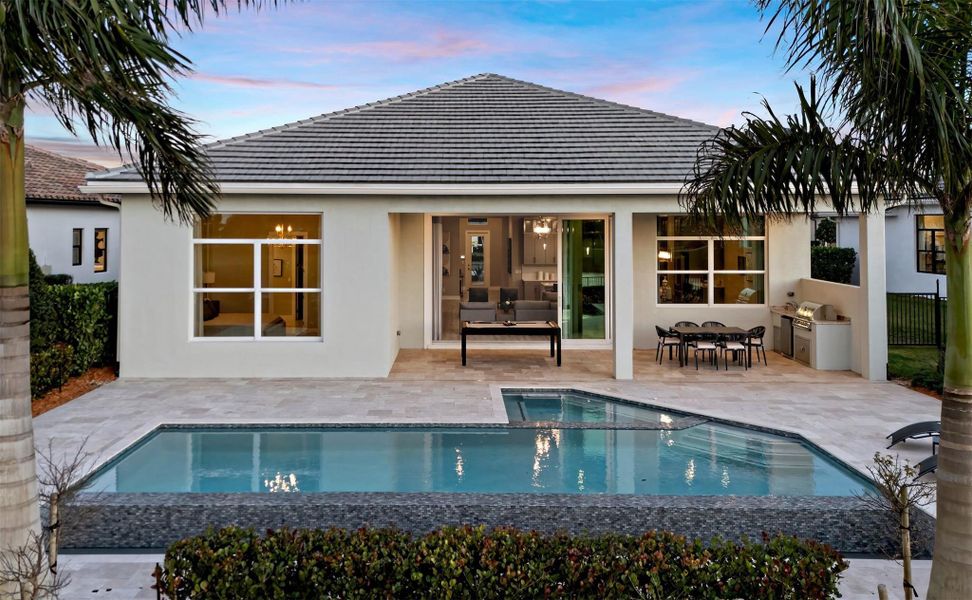 Exterior details and patio area of a home in PGA Village Verano, Port St. Lucie (Image 3).