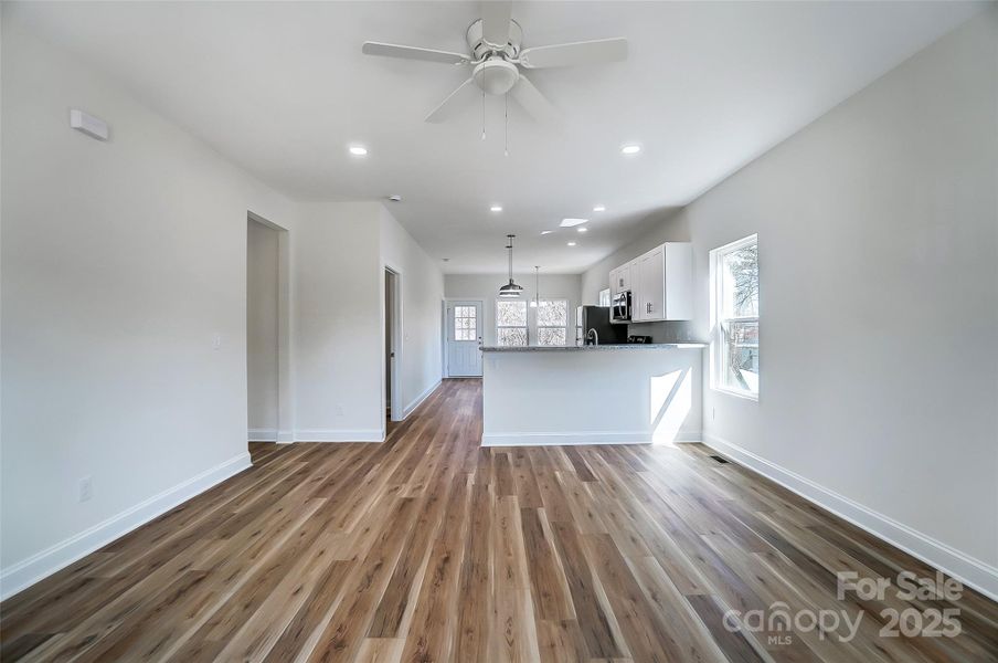 Open Floorplan of Living Room leading to the Kitchen