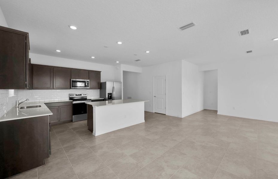 Furnished interior view inside a new home in Hyland Trail, Green Cove Springs (Image 9).