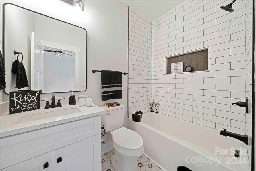 Full Bath 2 with tiled Shower & quartz counters.