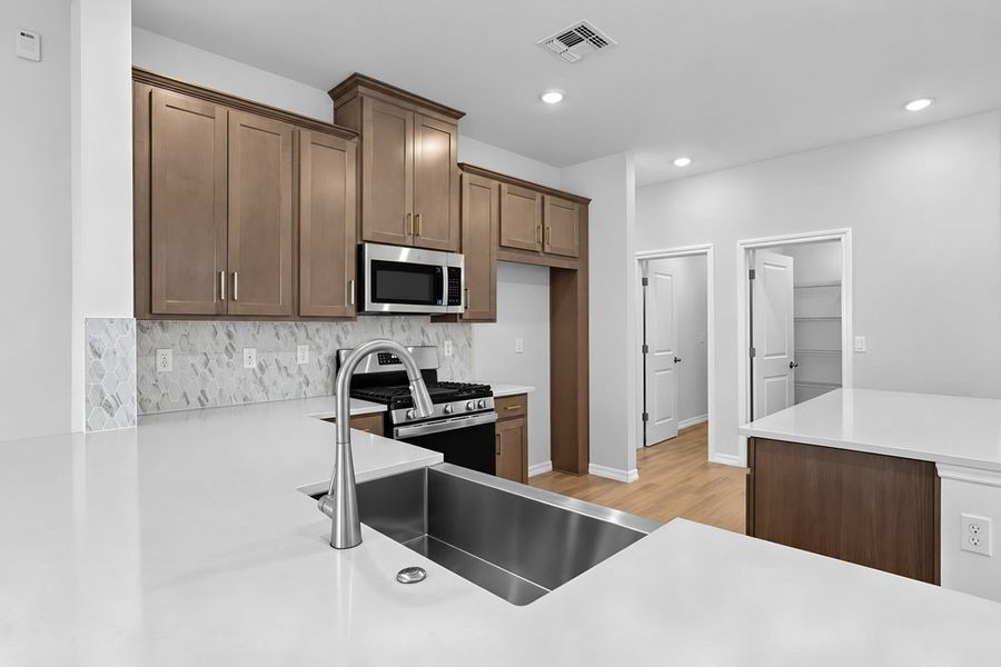 Furnished interior view inside a new home in Lochside, Mount Dora (Image 5). Furnished interior view inside a new home in Lochside, Mount Dora (Image 5).