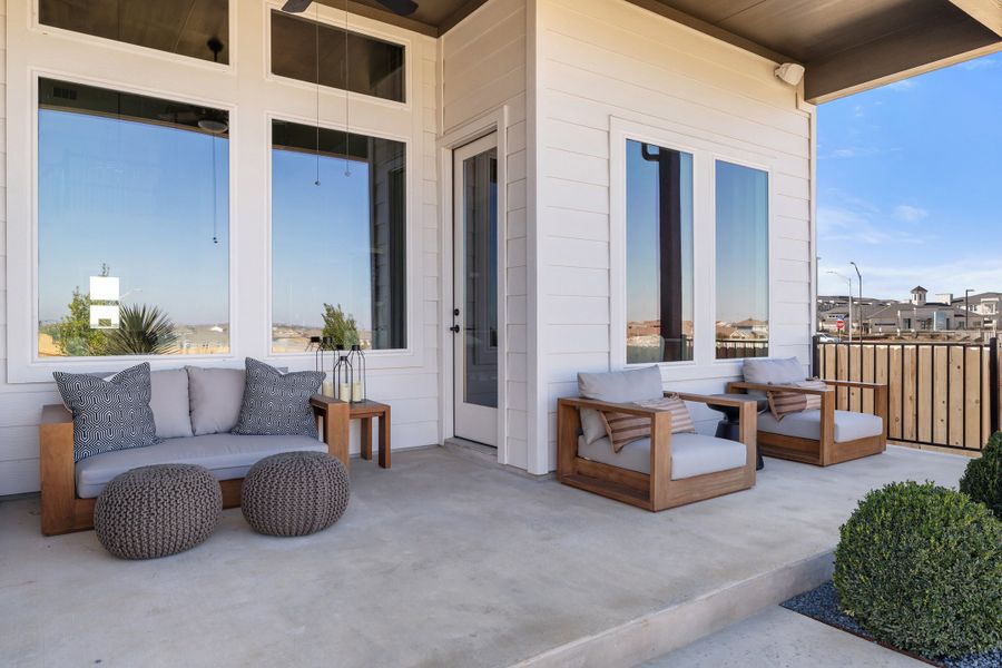 Exterior details and patio area of a home in Heritage, Dripping Springs (Image 28).