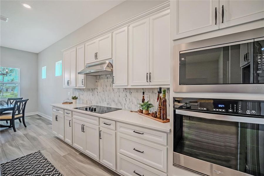 Furnished interior view inside a new home in Del Webb Stone Creek, Ocala (Image 17).