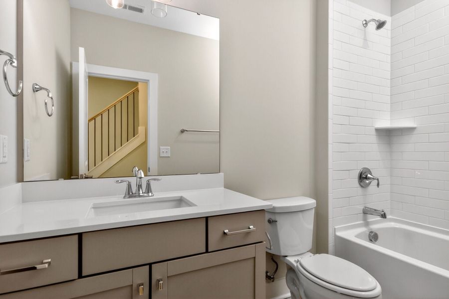 Representative furnished interior of a home built from the Ember B by Homes by Dickerson in Chatham Park, Pittsboro (Image 7).