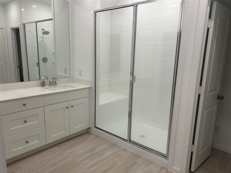 The large Walk-in Shower features a bench seat. The large Walk-in Shower features a bench seat.